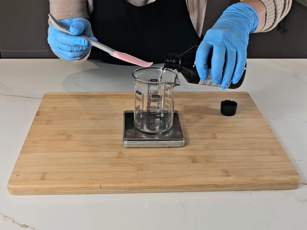 Weigh and place waters into a beaker.