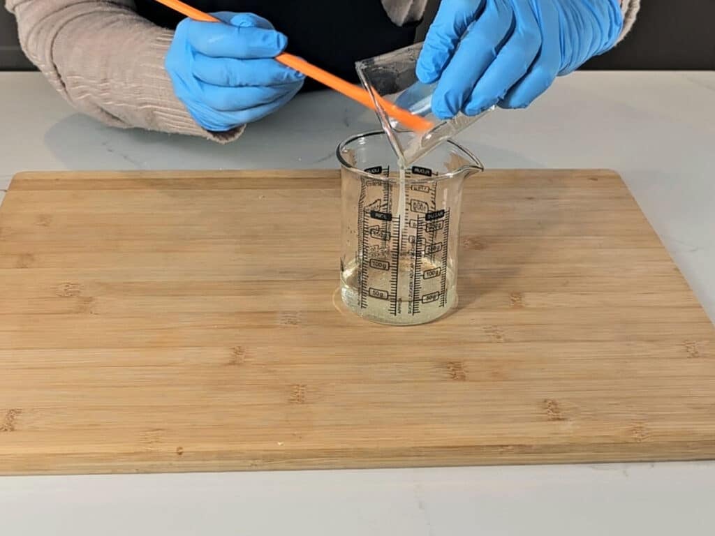 mix the content of the two beakers together