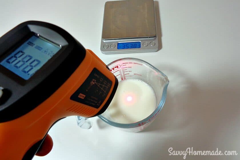 using an infrared gun to test temperature when making diy face cream step