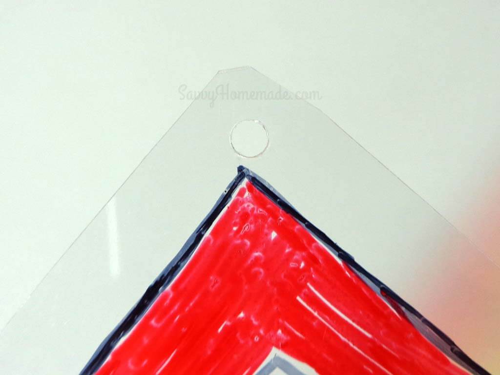 Cut out your design and punch a hole into the top