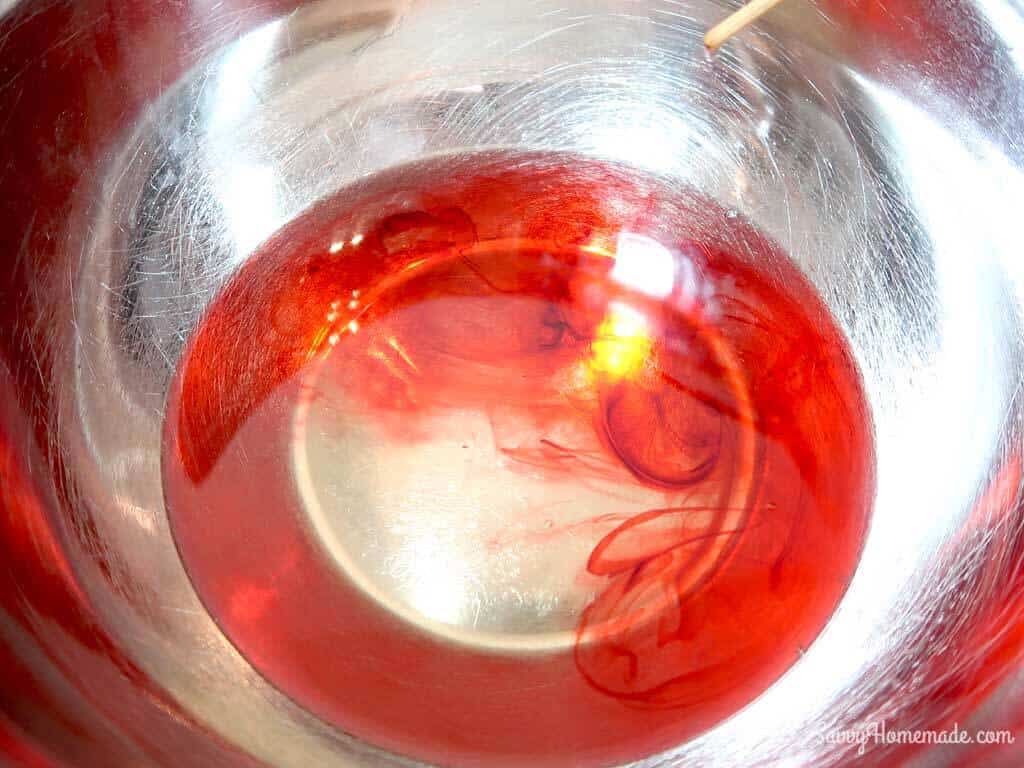Once the wax has fully melted stir in the candle dye