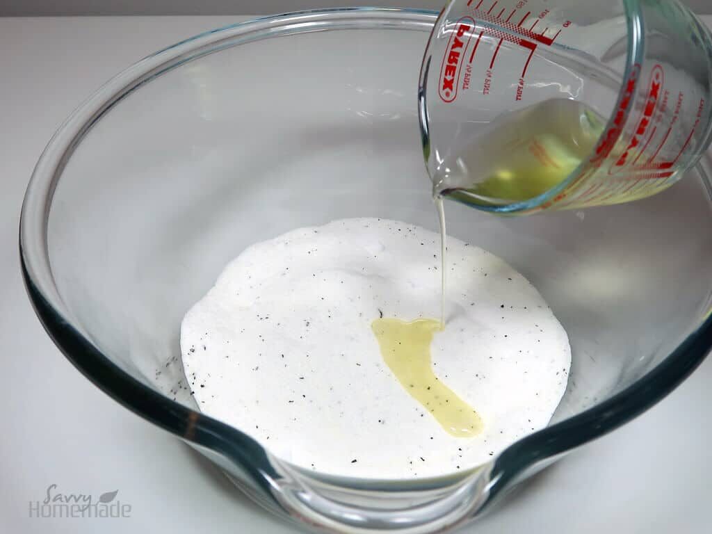 Add your fragrance oil to the melted oils and then pour into your dry ingredients