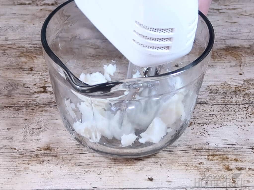using the electric hand blender, whisk the butter