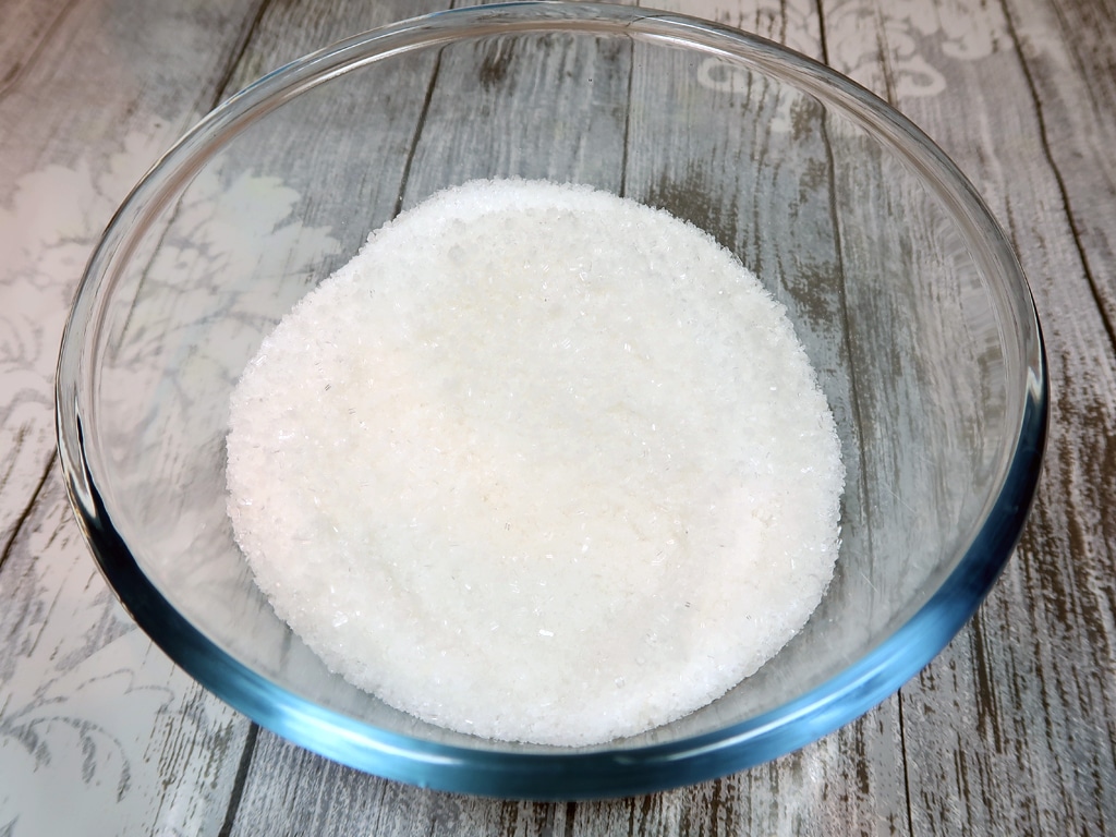 Place both salts into a medium-size mixing bowl