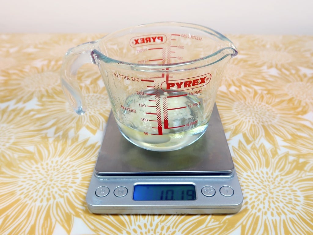 Start by weighing out your oils and wax