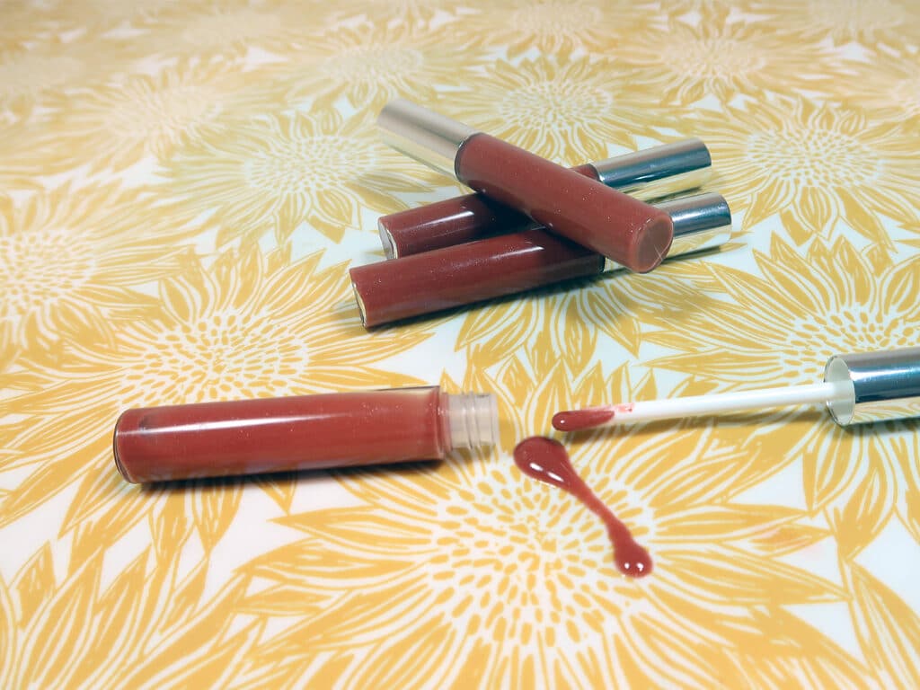 Your lip gloss doesn't need a preservative, and should stay good for up to a year (approx)