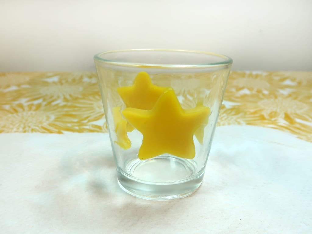 Step 5: Stick your imbeds to the inside of your container using mod podge to seal it