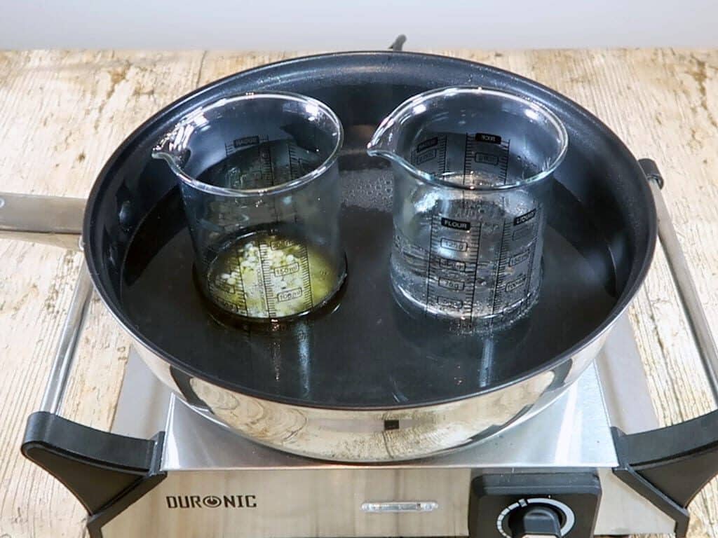 The oil part is beginning to melt as it sits, with the water part, in the double boiler