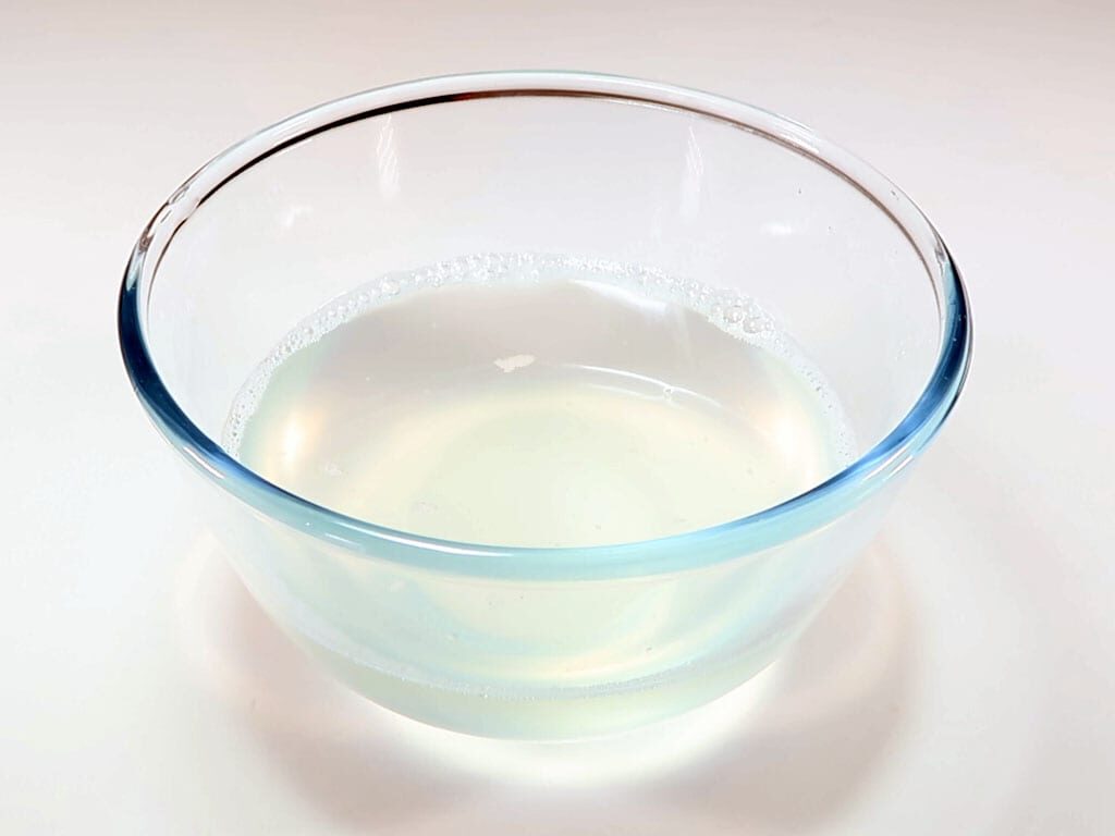 Melted coconut oil in a bowl