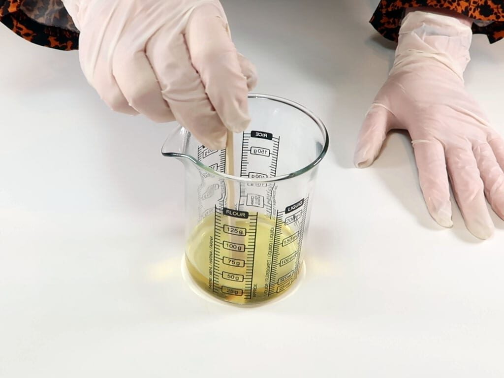 The perfume mixture is stirred