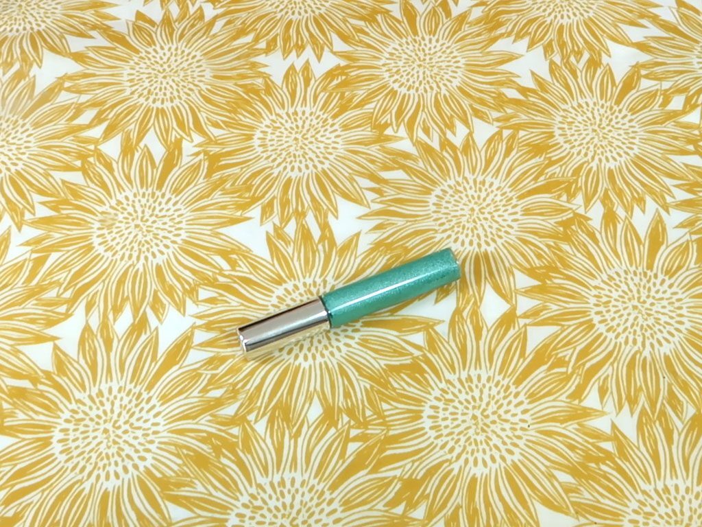 A green tinted gel eyeshadow