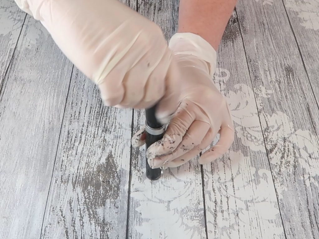 The lid/applicator is applied to the mascara tube to ensure the product remains fresh