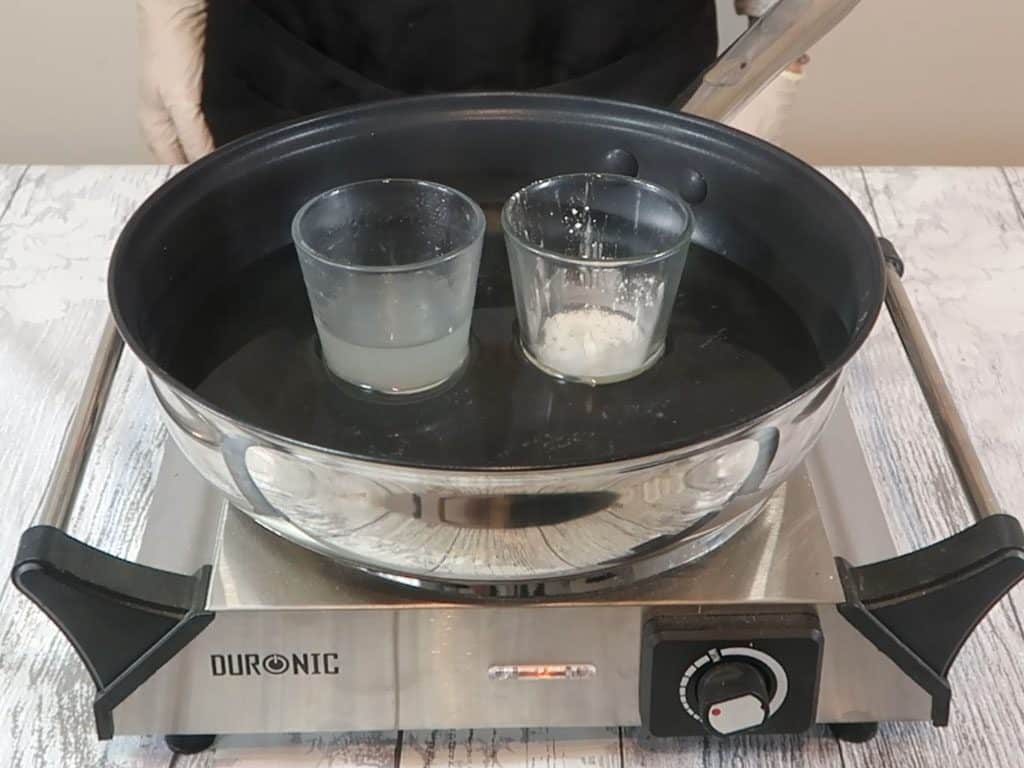 The water and oil parts are both warmed in a water bath