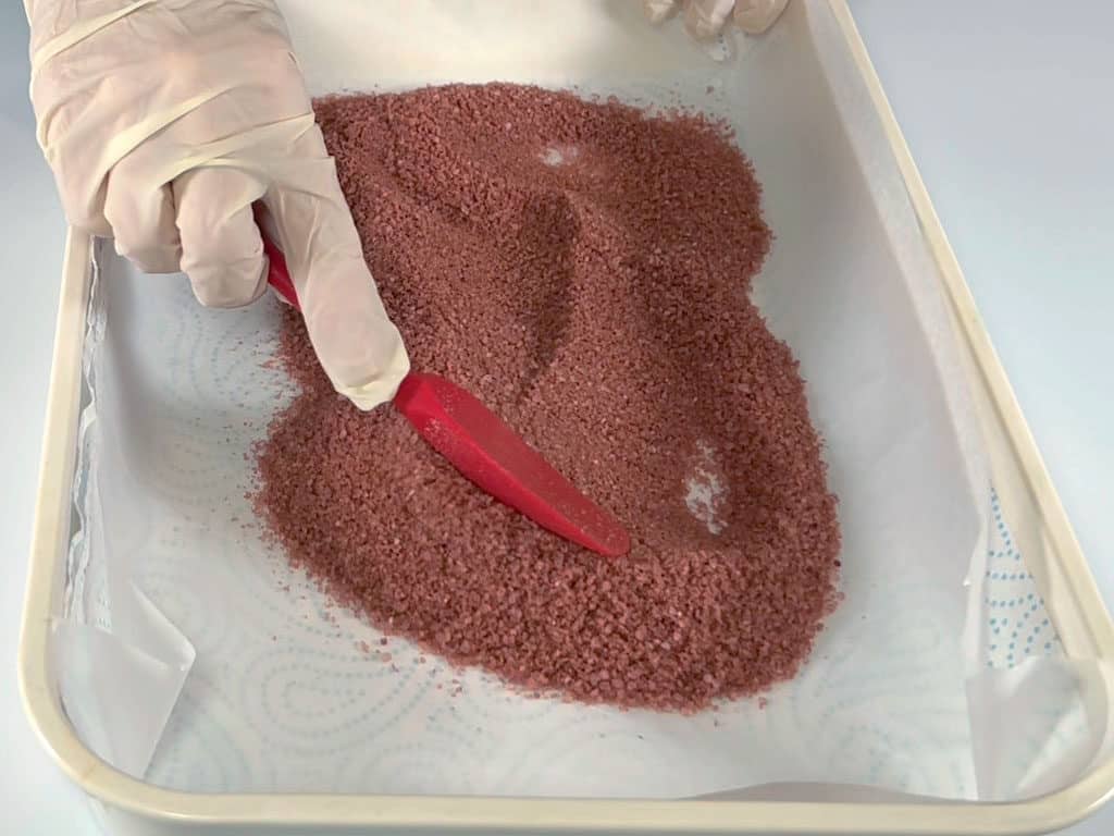 Spread the salts onto some baking parchment