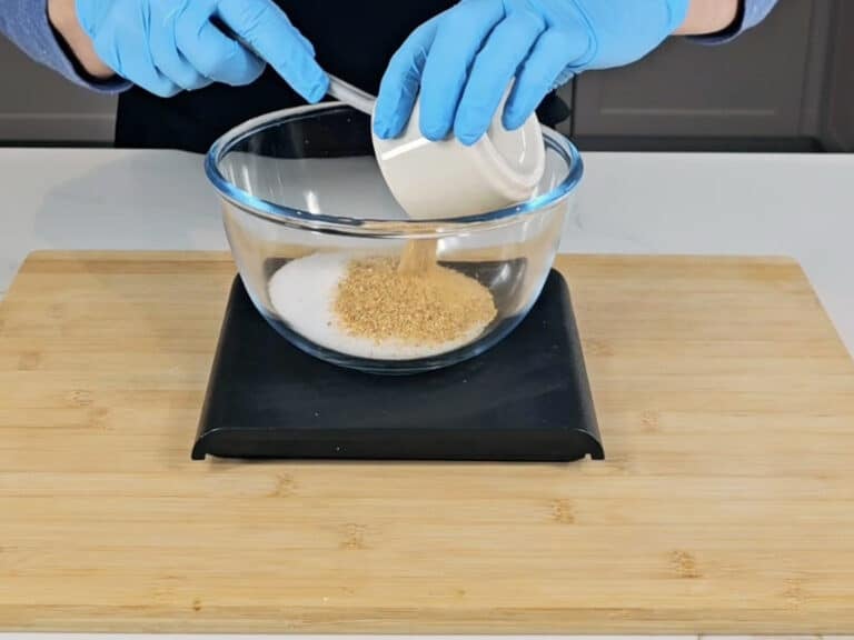 Weigh the salt and lemon peel powder into a bowl