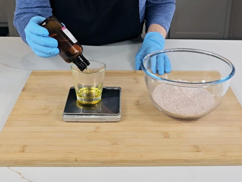 mix the strawberry seed oil, vitamin e, fragrance oil, and preservative.