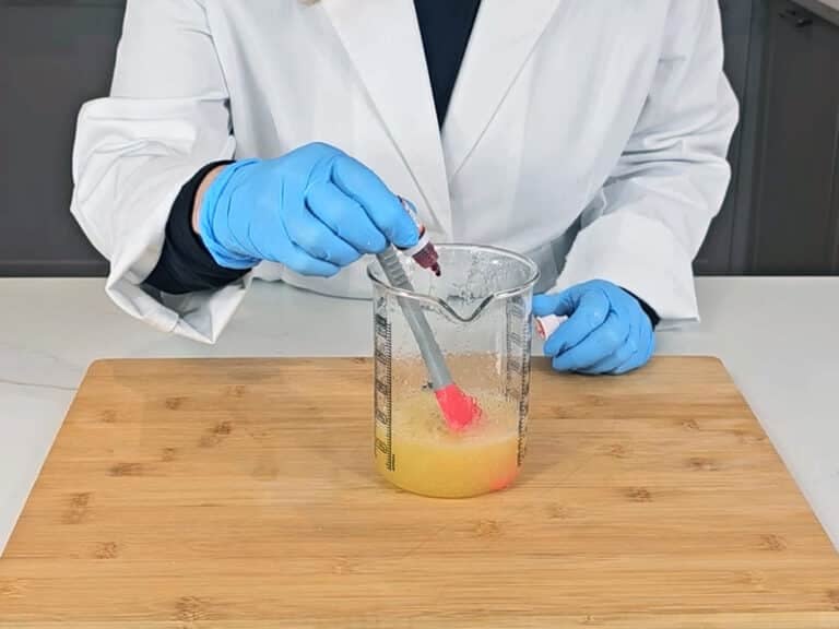 adding a drop of natural food coloring
