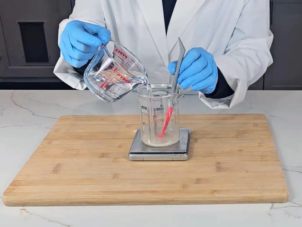 Add the water to the gum slurry