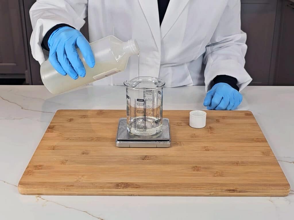 Weigh out then gently stir the surfactants together