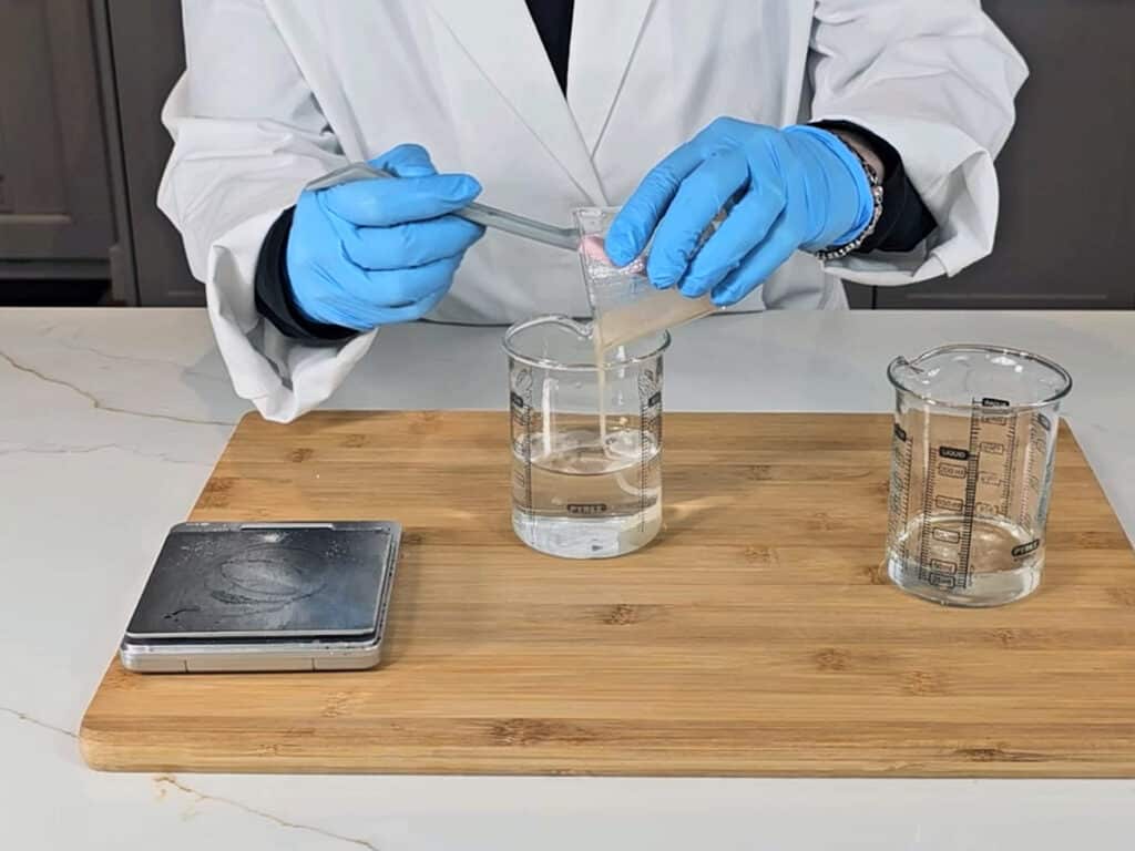 Pour the gum slurry into the water