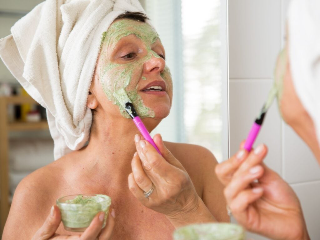 mature women using face mask