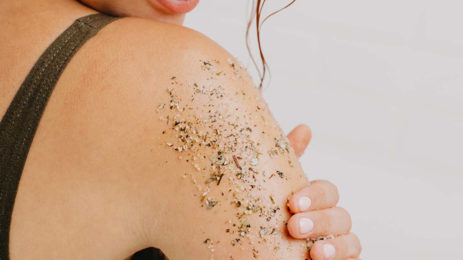 women using body scrub