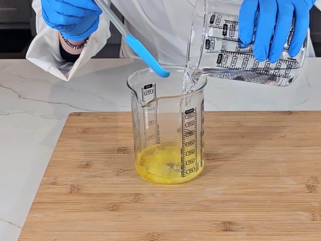 The water phase is poured into the oil phase