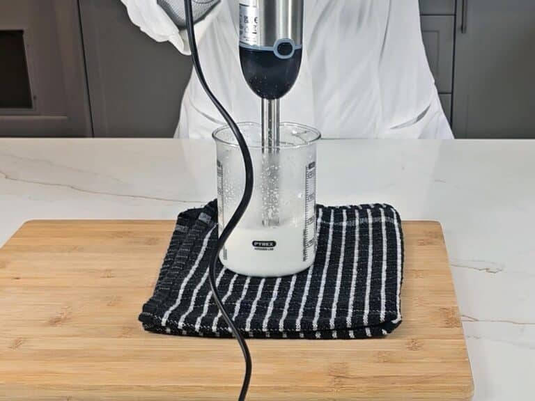 The mixture is blended with a stick blender