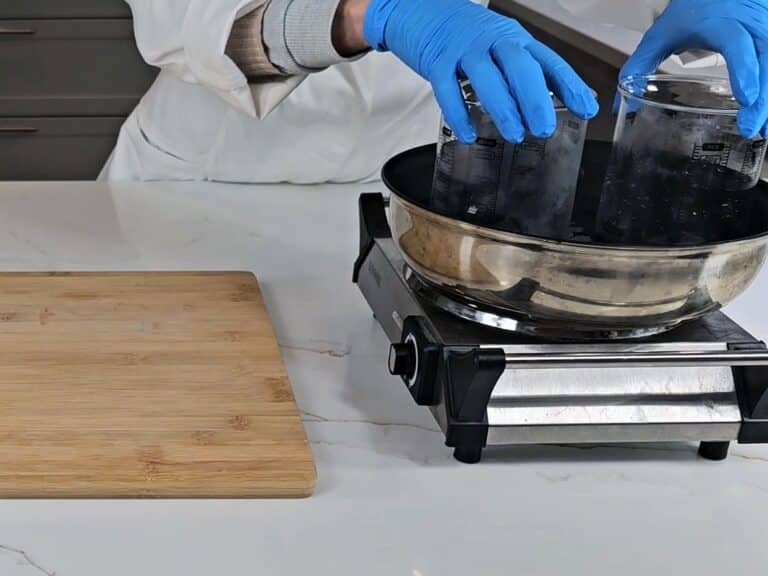 The oil and water phases are placed into a water bath