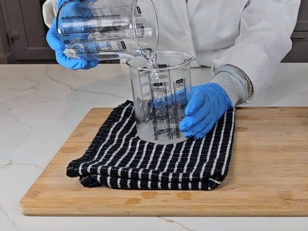 The water phase is poured into the oil phase