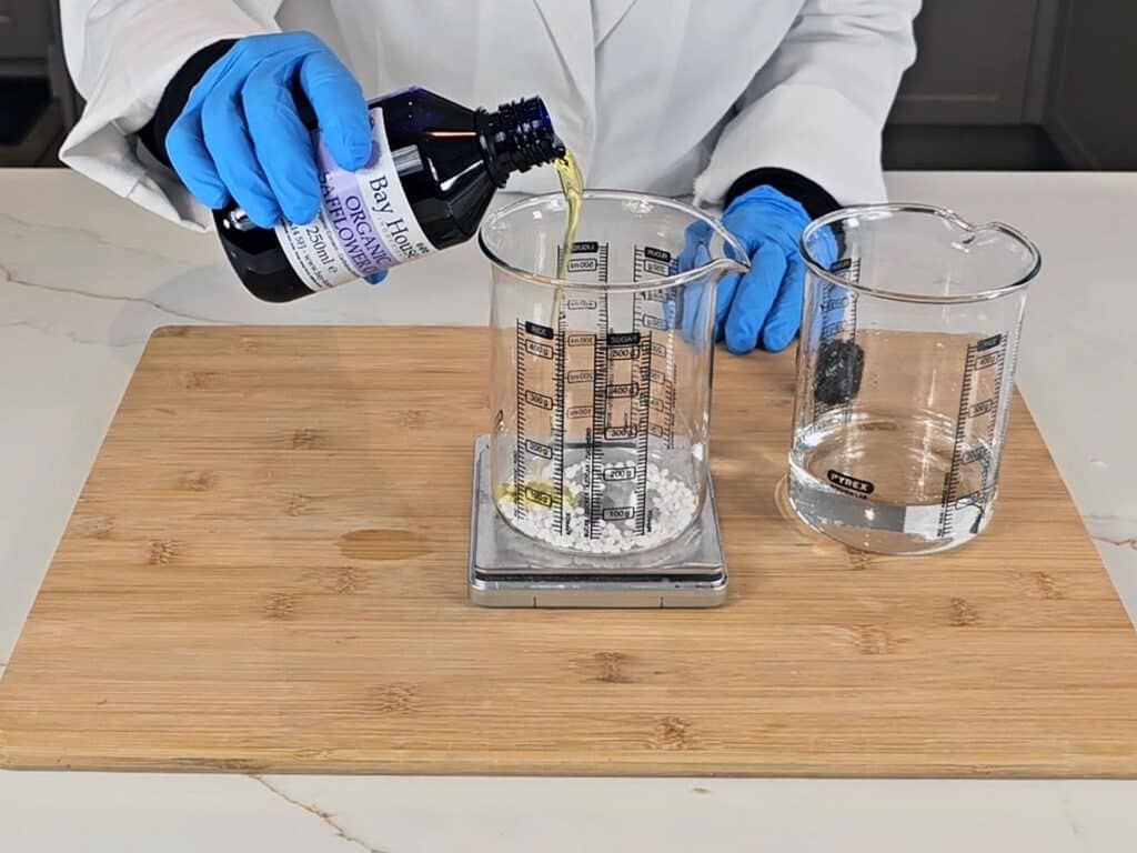 The oil phase ingredients are measured into another heat proof vessel