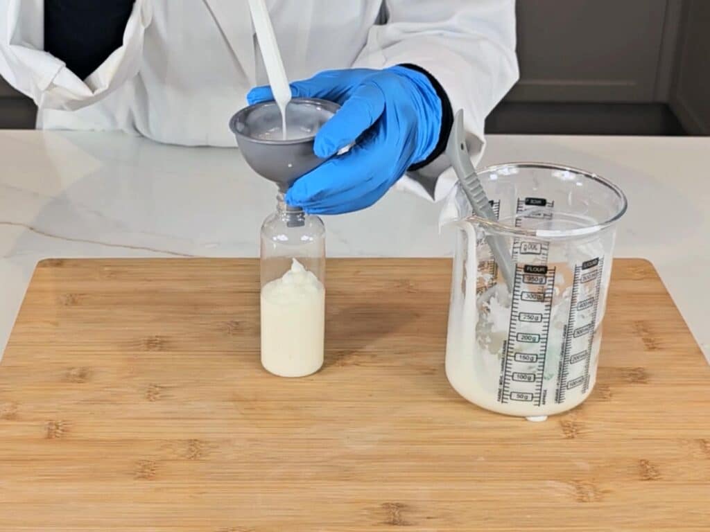 The emulsion is now transferred to a PET plastic bottle to store