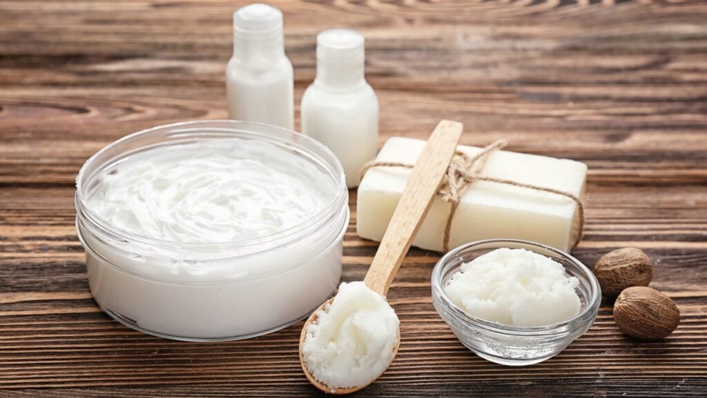 Beautiful shea butter in jar on table