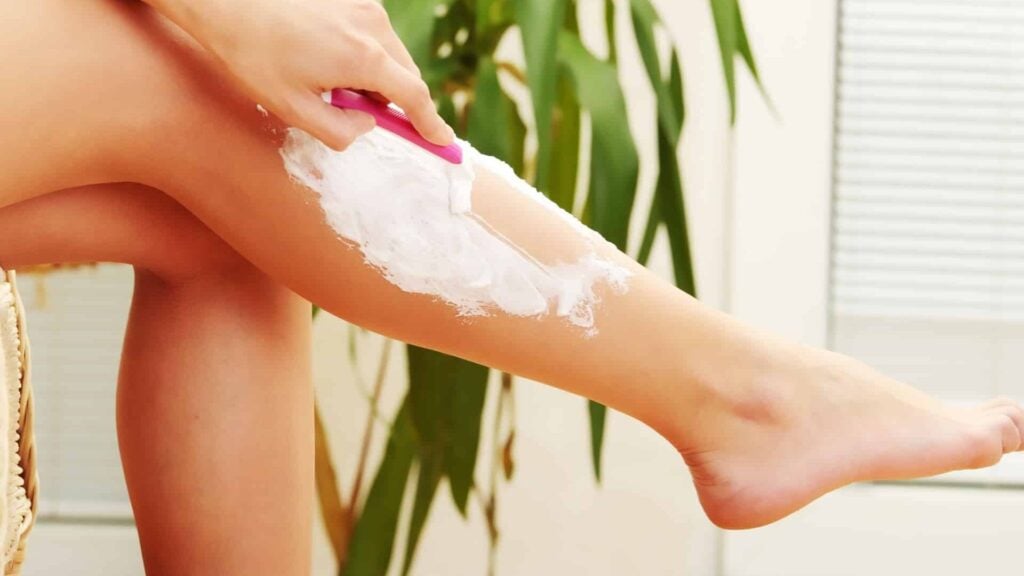 women shaving legs