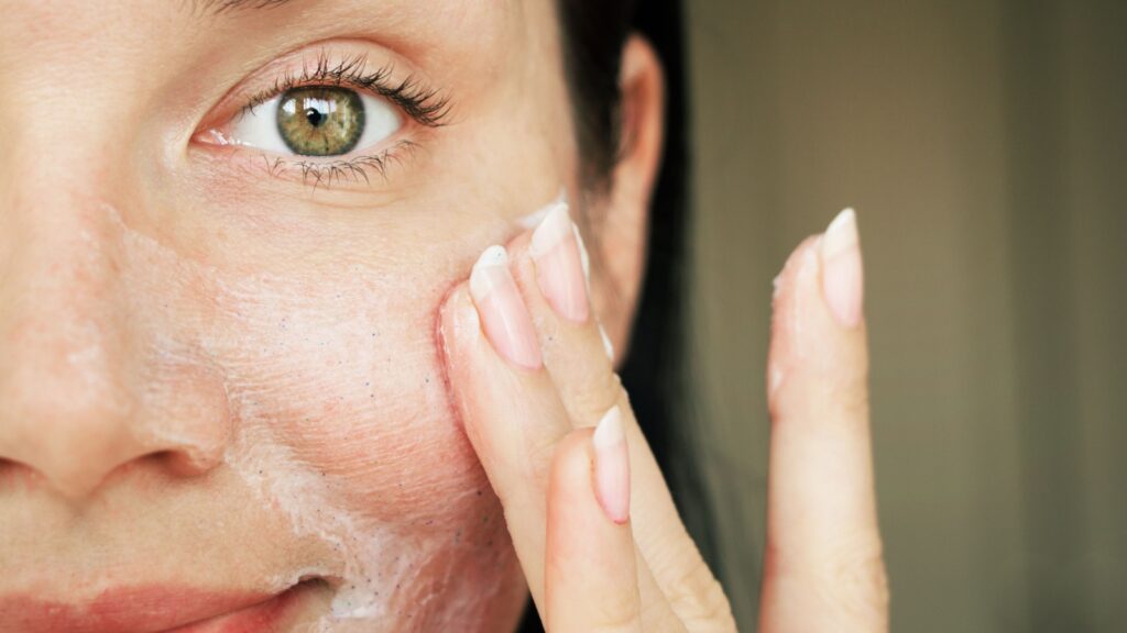 women using a face scrub
