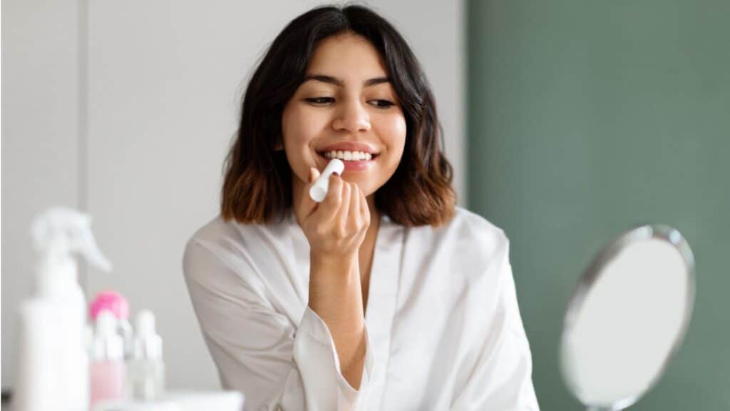 women using lipstick
