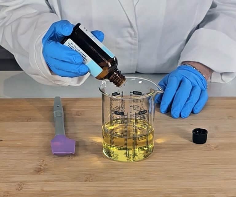 Lavender essential oil is added to the beaker
