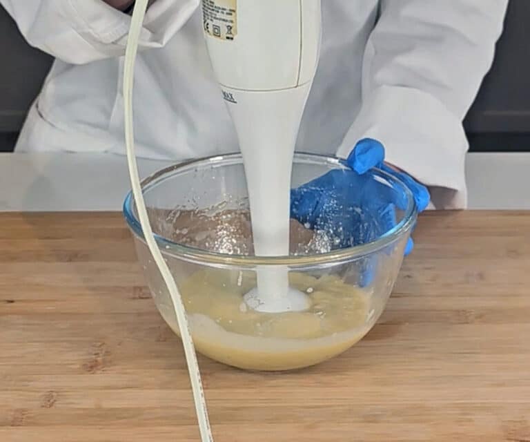 The mixture is blended with a stick blender