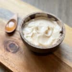 A small bowl of mayo in DIY hair care treatment
