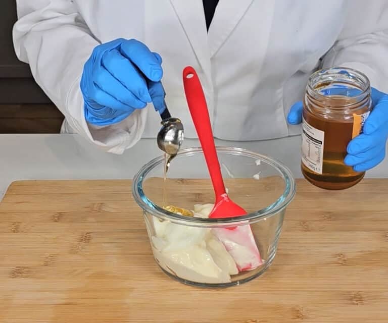 Honey is added to the mixing bowl