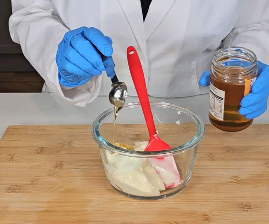 Honey is added to the mixing bowl