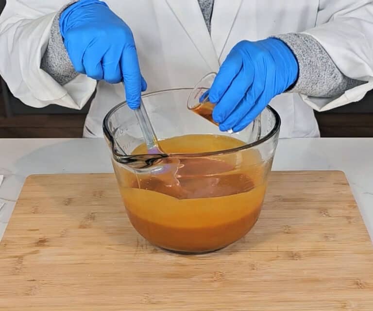 The essential oils are added to the soap batter.