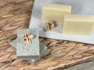 Two bars of DIY castile soap, one plane recipe and one with nettle leaf powder