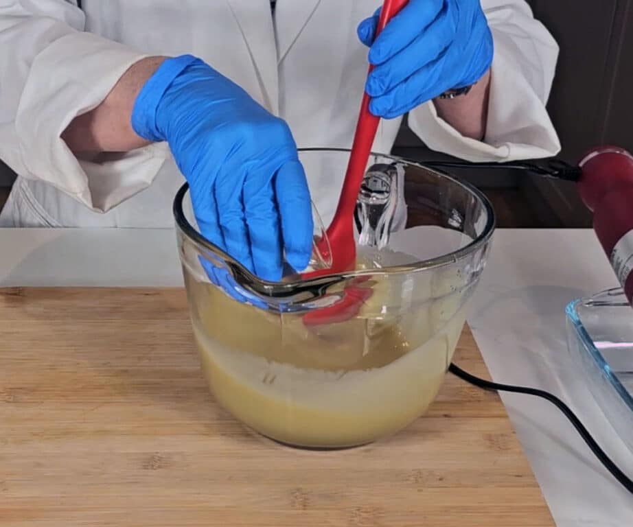 The lavender essential oil is added to the soap batter
