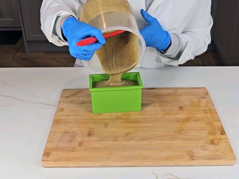 The soap batter is poured into a silicon soap mold