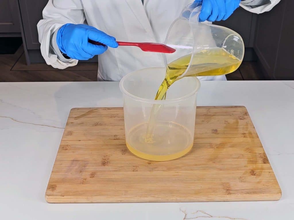 Liquid oils are poured into the melted solid oils