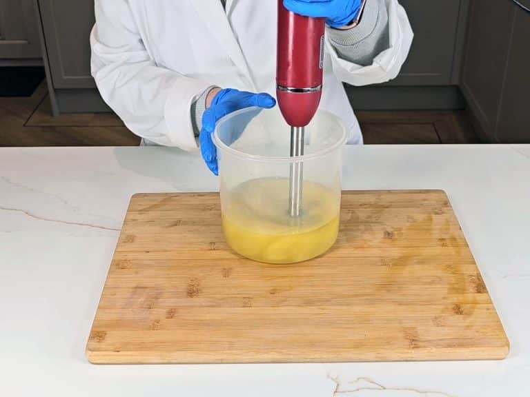 The soap batter is blended with a stick blender