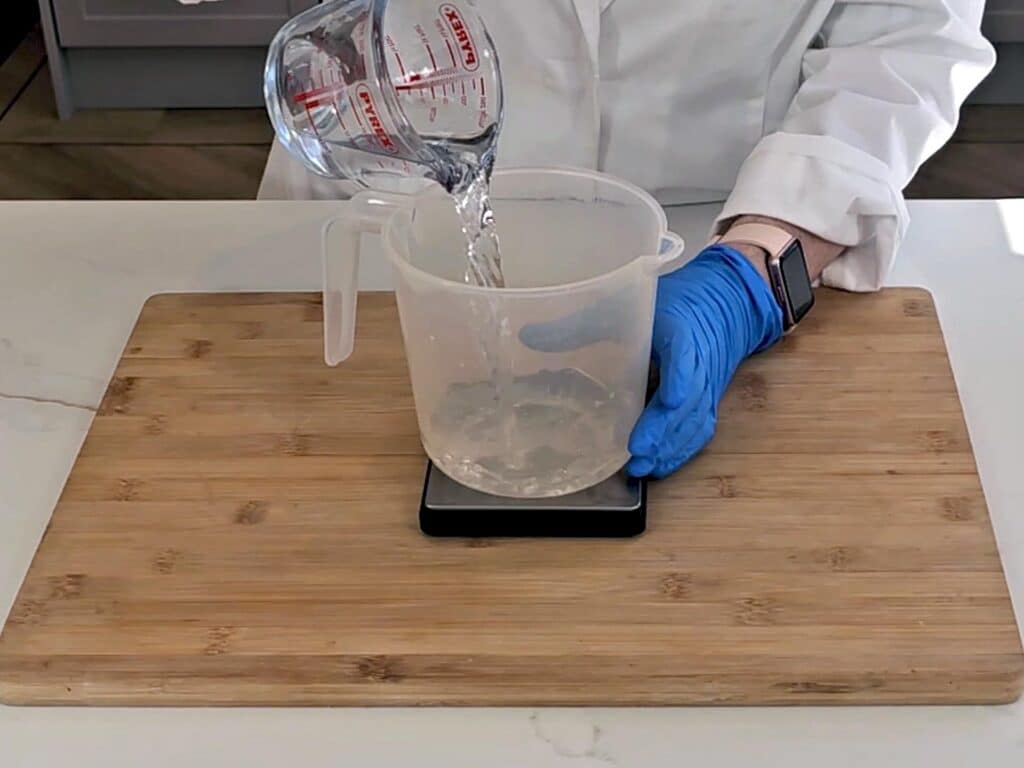 Distilled water is poured into a PET plastic pitcher