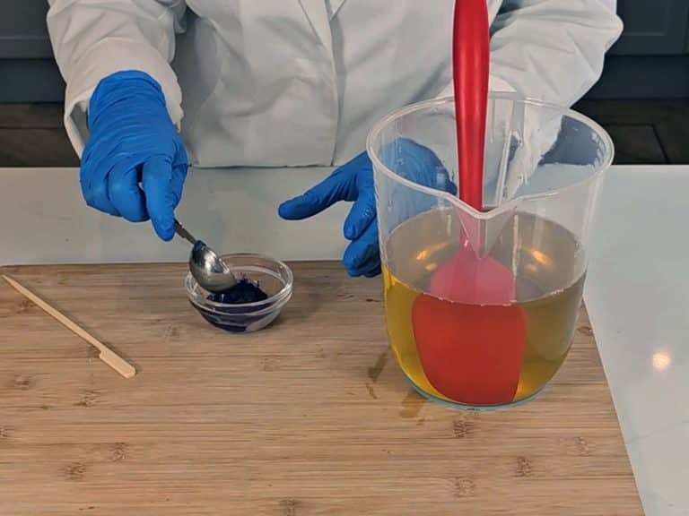 Purple mica is mixed with a tablespoon of our warmed oils