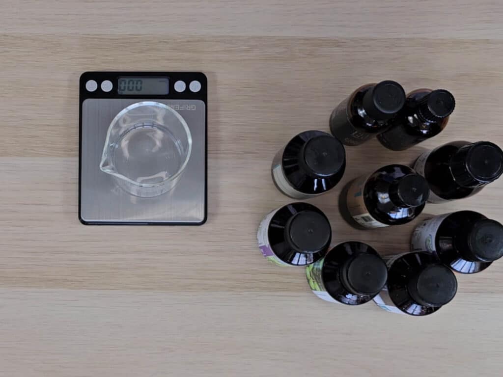 Place a clean, sterilized beaker onto the digital scale and press the tare button.